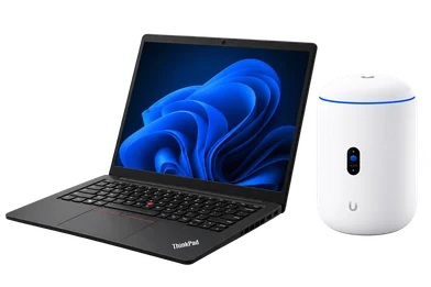 Dream Router 7 beside a black Lenovo ThinkPad laptop.